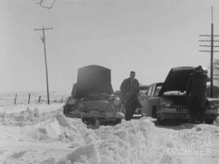 Dubuque, Iowa - Aftermath of Snow Storm, Lost Motorists Returning to Abandoned Vehicles 3-9-61