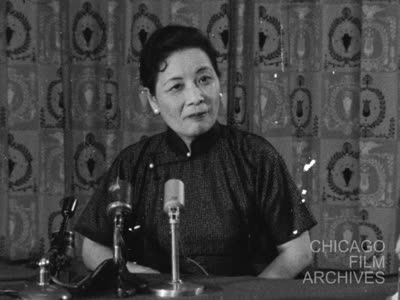 Madame Chiang [Kai-shek] - Chicago - 9-3-58 neg. Trims SOF and Sil.