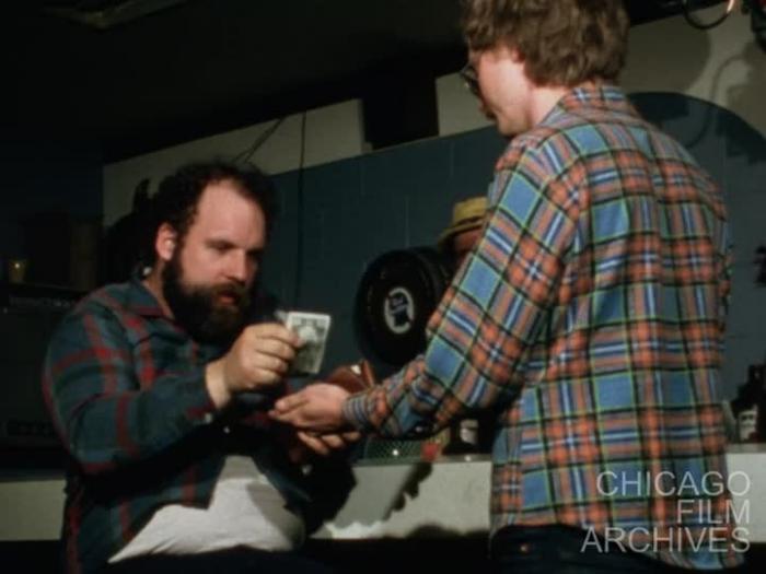 This is the film Rudy in which Jim Nahrath and Doug Corcoran are talking to me in the bar and Doug wants me to give him some money. I don't want to have sex with the girls in the back room I tell him. March 1982. The sound is a little garbled but it is understandable.